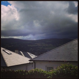 Rain clouds and blue skies in the same picture. Confused Irish weather